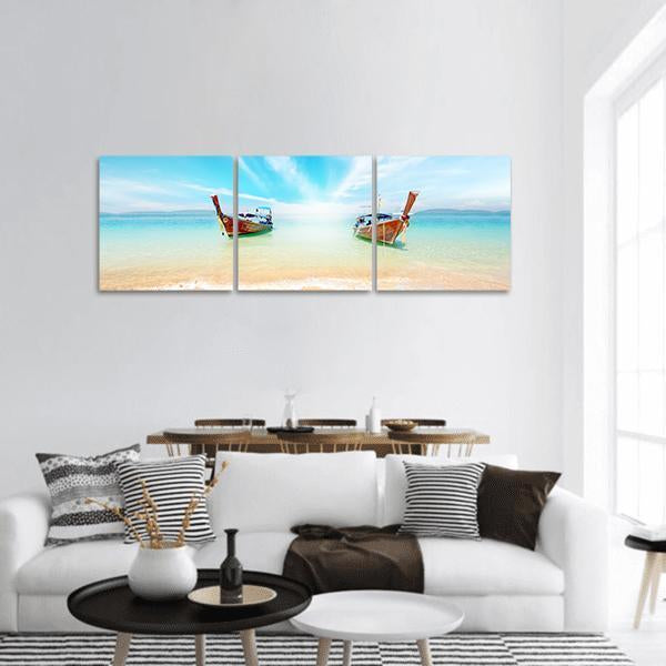 Phuket Longtail Boats on Turquoise Shore Panoramic Canvas Wall Art in white, beige and blue, hung on a wall