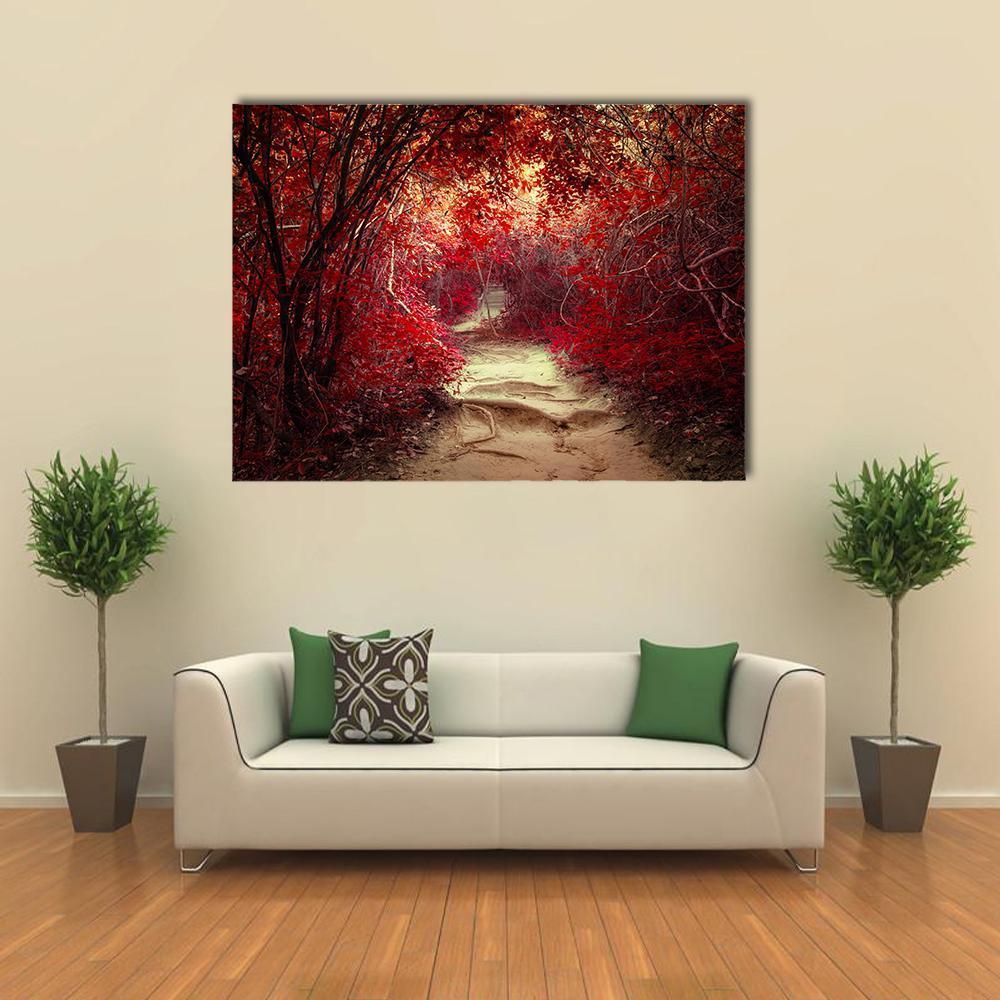 Winding Path Through Tropical Forest Canvas Wall Art in beige, brown and red, single panel hung on a wall
