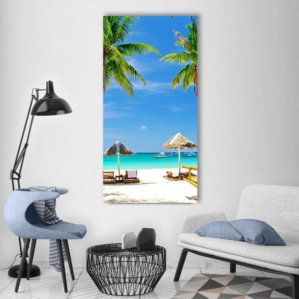 Tropical Beach with Palapas and Lounge Chairs Vertical Canvas Wall Art in white, green and blue, single vertical panel hung on a wall