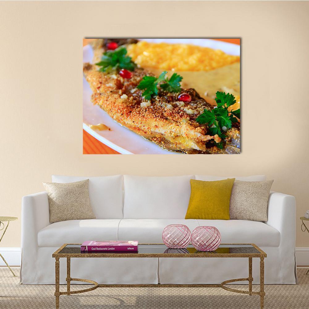 Breaded Trout with Parsley, Polenta, Pomegranate Canvas Wall Art in beige, brown and yellow, single panel hung on a wall