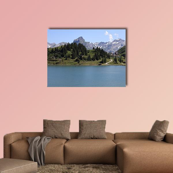 Trubsee Lake Landscape Canvas Wall Art in gray, green and blue, single panel hung on a wall