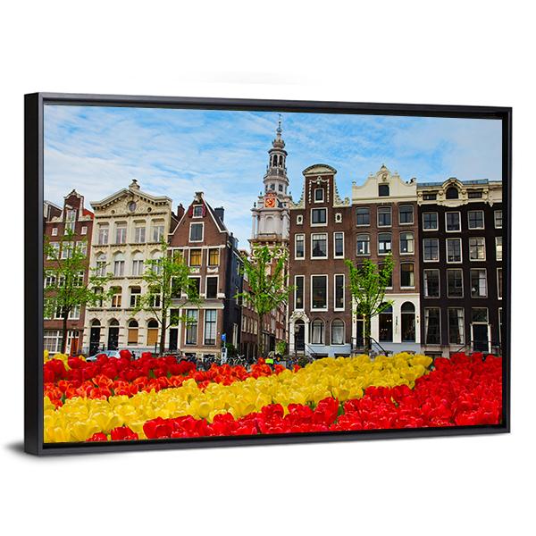 Tulips And Facades Of Old Houses In Amsterdam Canvas Wall Art-3 Horizontal-Gallery Wrap-25" x 16"-Tiaracle