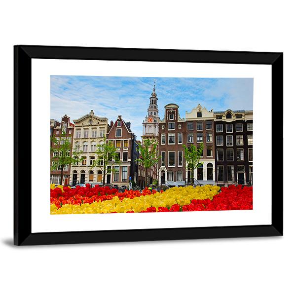 Tulips And Facades Of Old Houses In Amsterdam Canvas Wall Art-3 Horizontal-Gallery Wrap-25" x 16"-Tiaracle