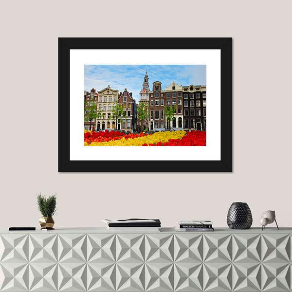 Tulips And Facades Of Old Houses In Amsterdam Canvas Wall Art-3 Horizontal-Gallery Wrap-25" x 16"-Tiaracle