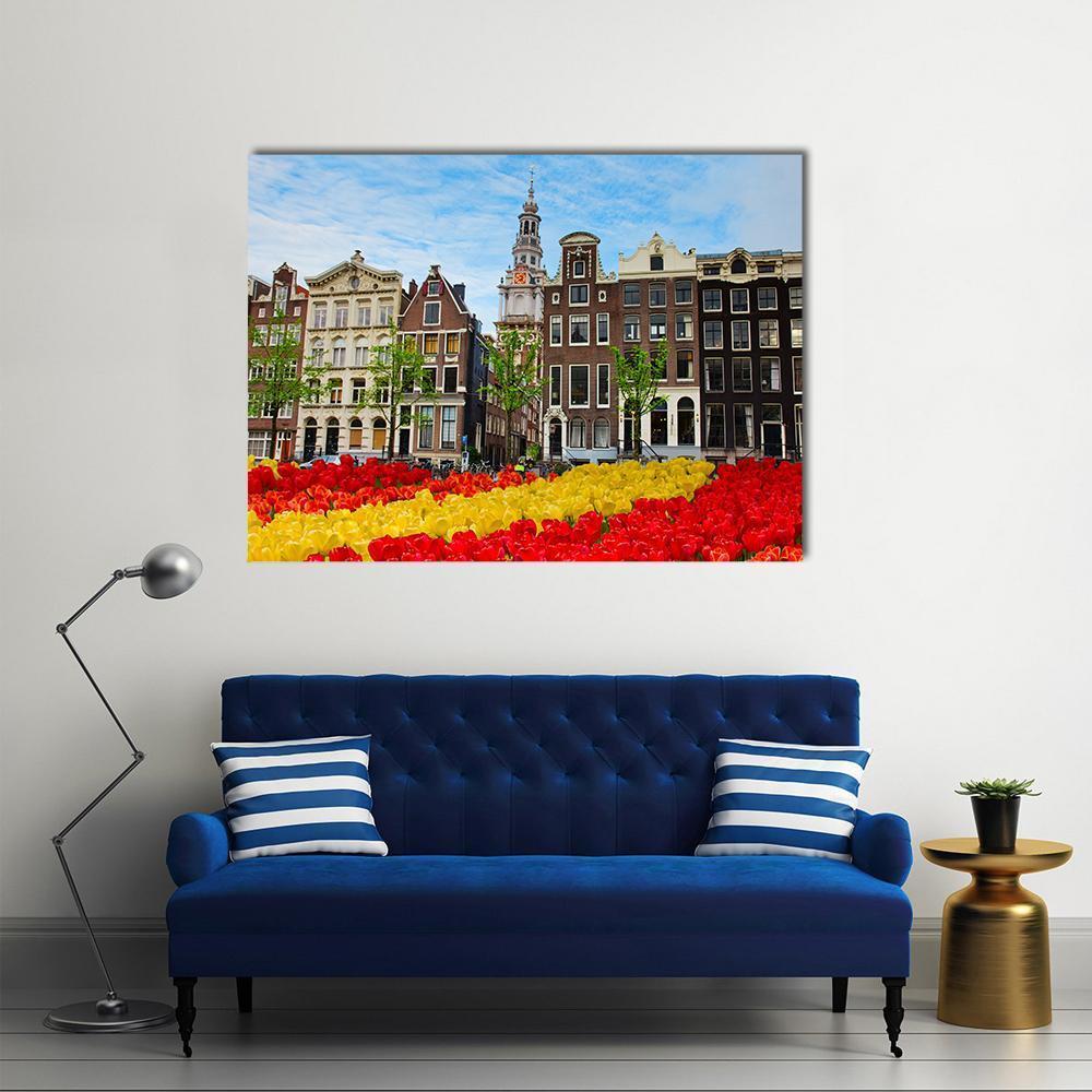 Tulips And Facades Of Old Houses In Amsterdam Canvas Wall Art-1 Piece-Gallery Wrap-48" x 32"-Tiaracle