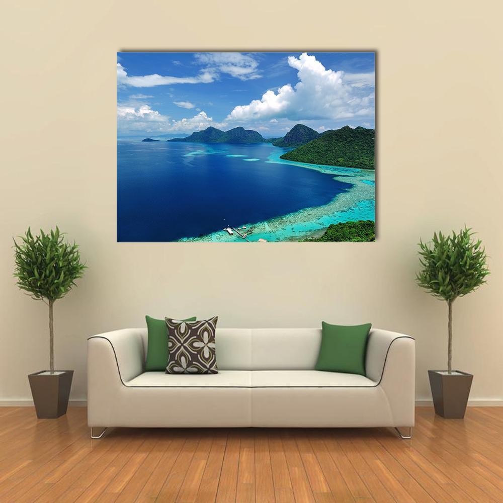 Tun Sakaran Marine Park Aerial View Canvas Wall Art in white, green and blue, single panel hung on a wall