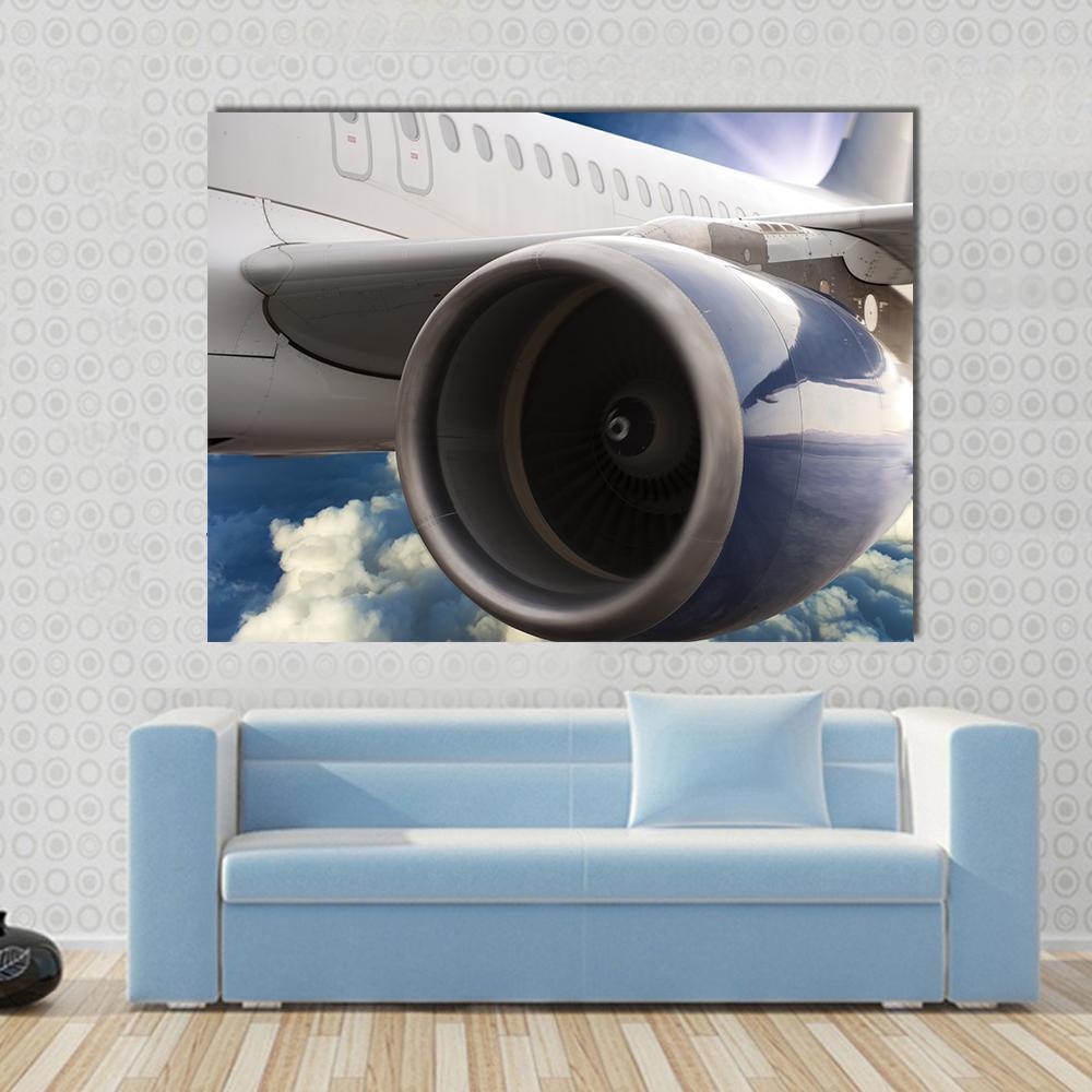 Airplane Engine Turbine Canvas Wall Art in white, gray and blue, single panel hung on a wall