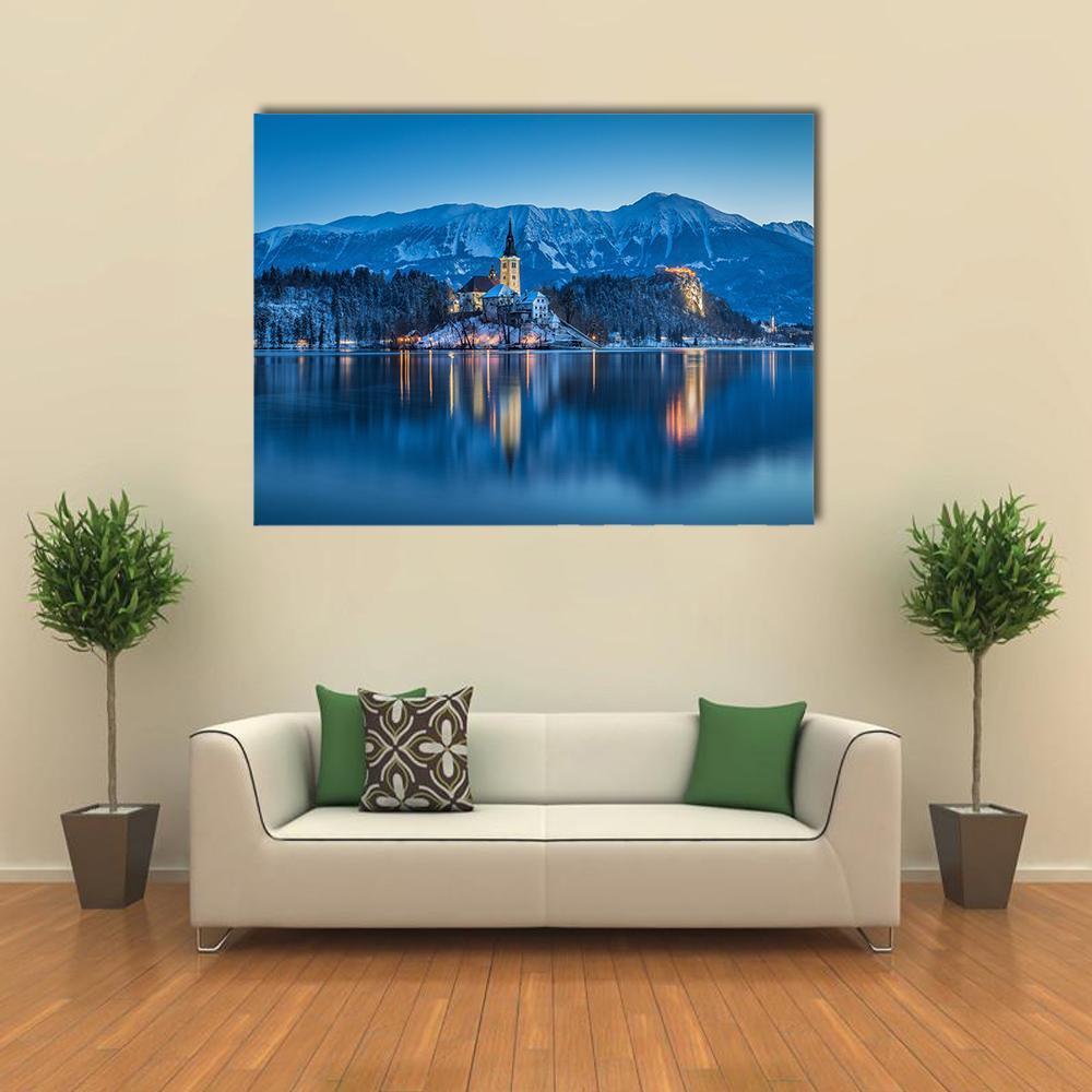Twilight Island Church Over Snowy Lake Canvas Wall Art in white and blue, single panel hung on a wall