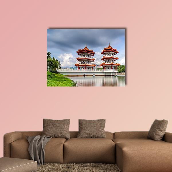 Twin Pagodas with White Bridge Canvas Wall Art in white, green and blue, single panel hung on a wall