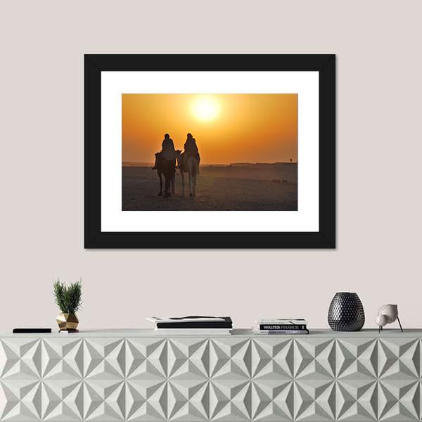 Two Camels Riding Towards Sun In Desert Canvas Wall Art-5 Horizontal-Gallery Wrap-22" x 12"-Tiaracle