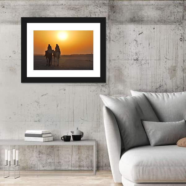 Two Camels Riding Towards Sun In Desert Canvas Wall Art-5 Horizontal-Gallery Wrap-22" x 12"-Tiaracle