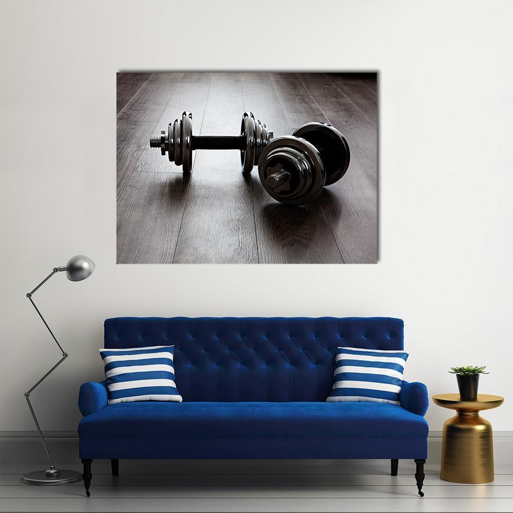 Dumbbells for Fitness Enthusiasts Canvas Wall Art in black, gray and brown, single panel hung on a wall