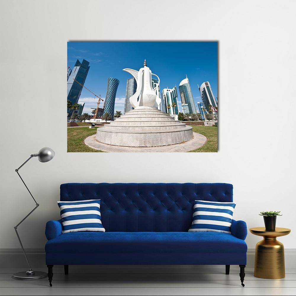 Dallah Sculpture Against Modern Skyline Canvas Wall Art in white, gray and blue, single panel hung on a wall