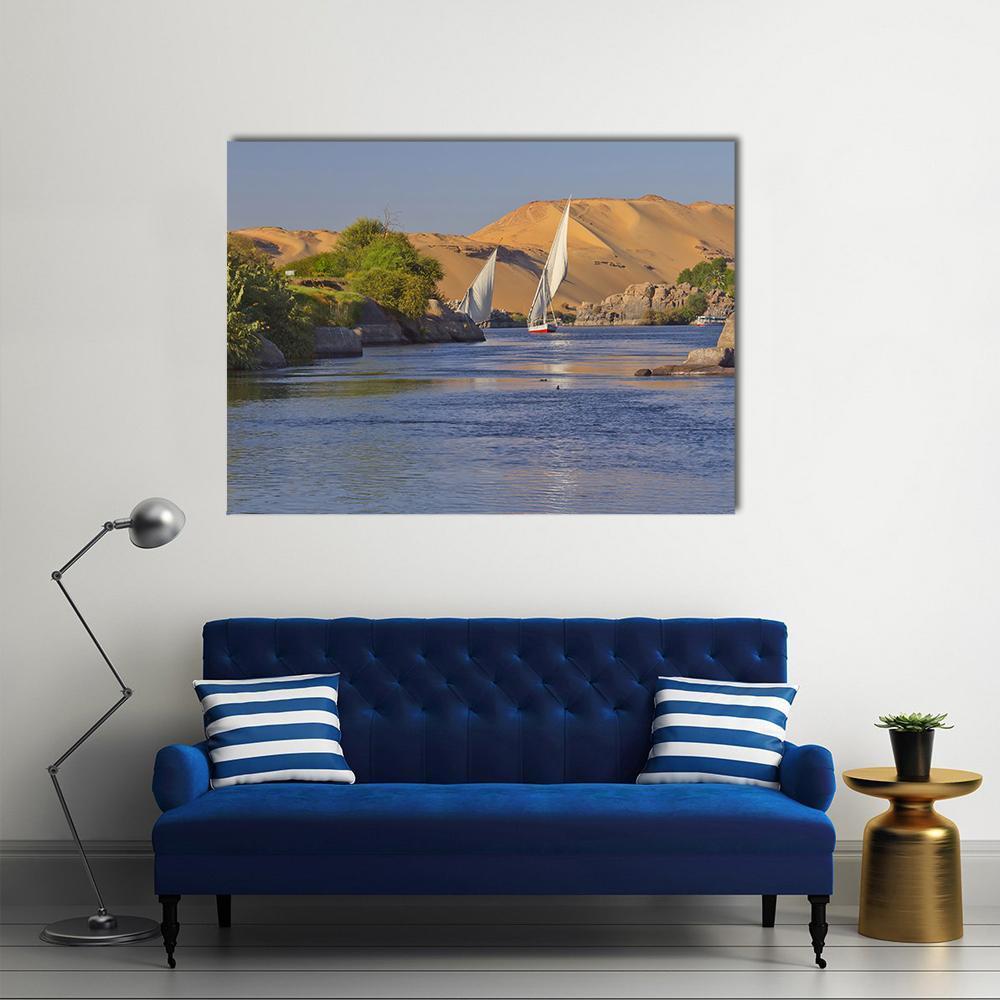 Felucca Sailboats on the Nile Canvas Wall Art in brown, gold and blue, single panel hung on a wall