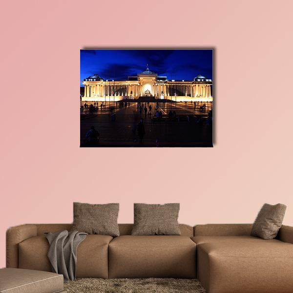 Ulaanbaatar National Museum at Night Canvas Wall Art in black, yellow and blue, single panel hung on a wall