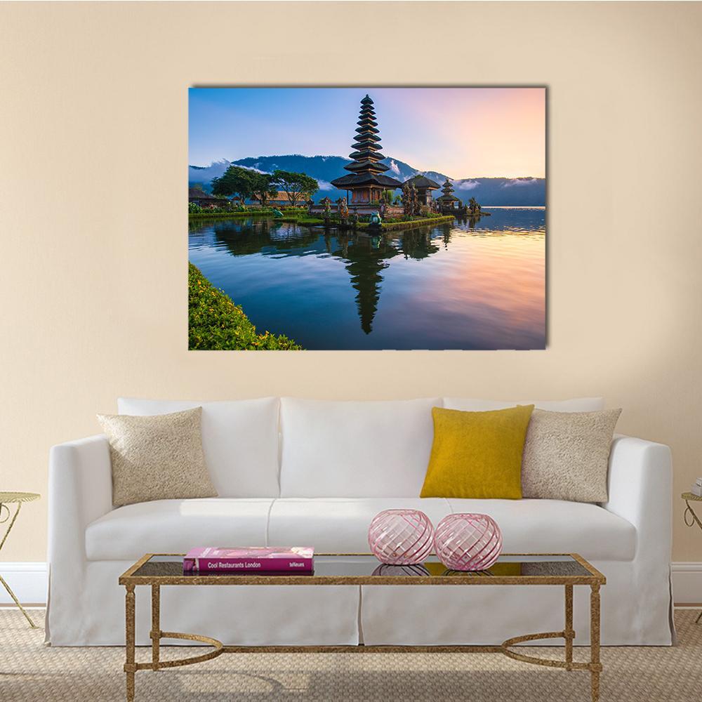 Ulun Danu Temple at Lake Sunrise Canvas Wall Art in orange, yellow and blue, single panel hung on a wall