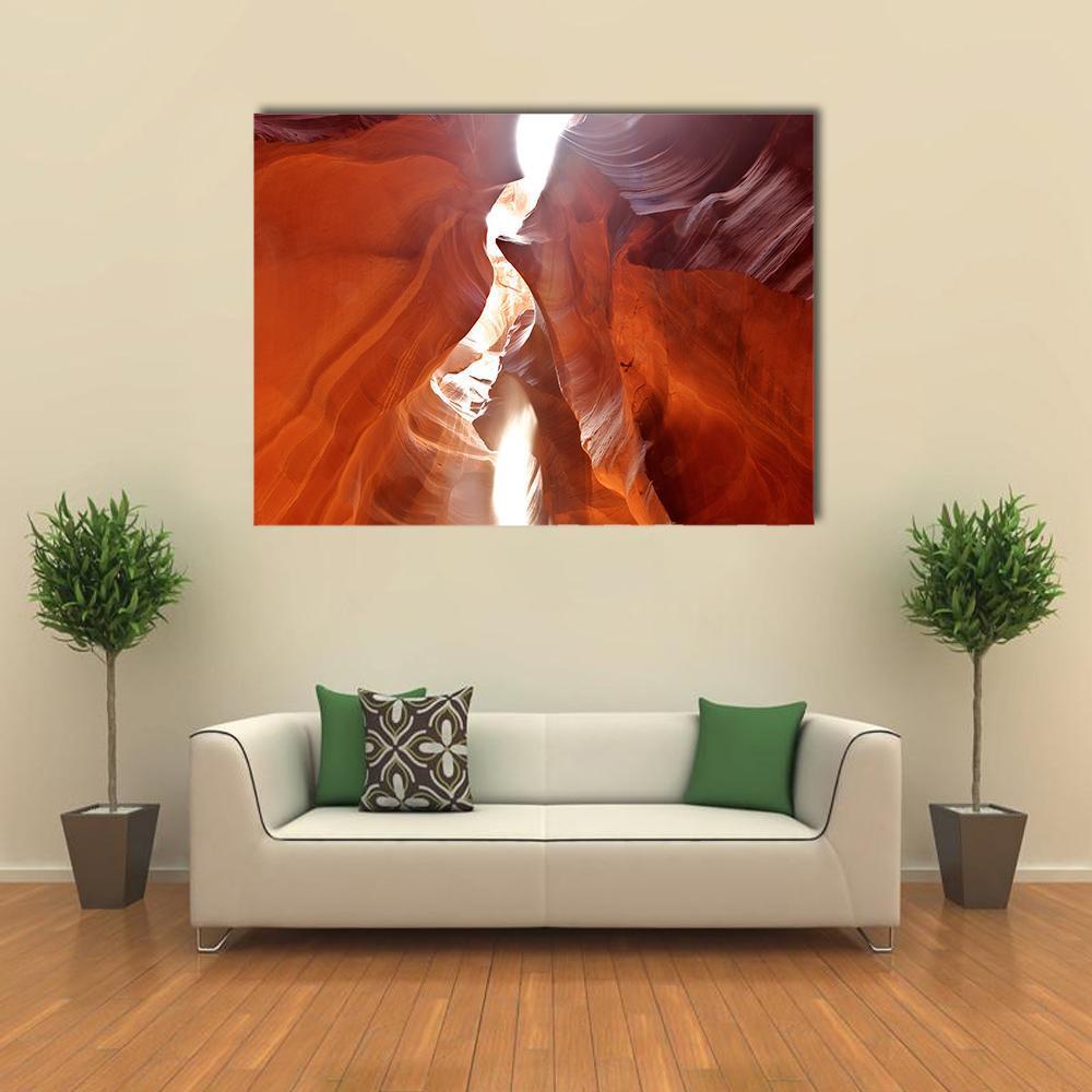 Upper Antelope Canyon Canvas Wall Art in brown, red and orange, single panel hung on a wall