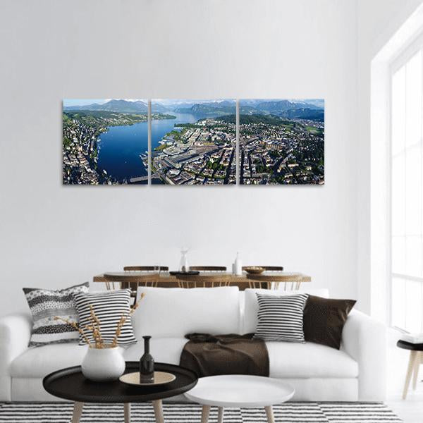 Lake Lucerne Aerial Cityscape Panoramic Canvas Wall Art in white, green and blue, hung on a wall