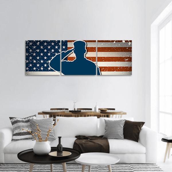 Us Army Soldier Saluting American Flag Panoramic Canvas Wall Art in white, red and blue, hung on a wall