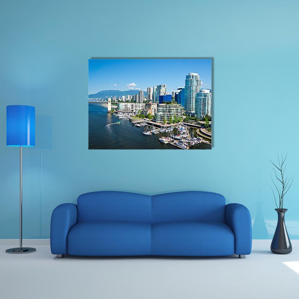 Vancouver Waterfront Skyline Canvas Wall Art in white and blue, single panel hung on a wall