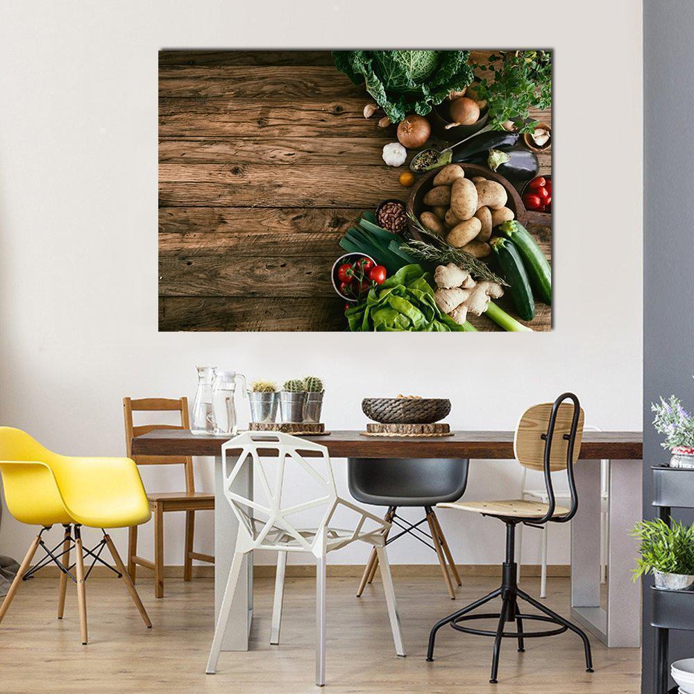 Fresh Vegetables on Wooden Table Canvas Wall Art in brown and green, single panel hung on a wall