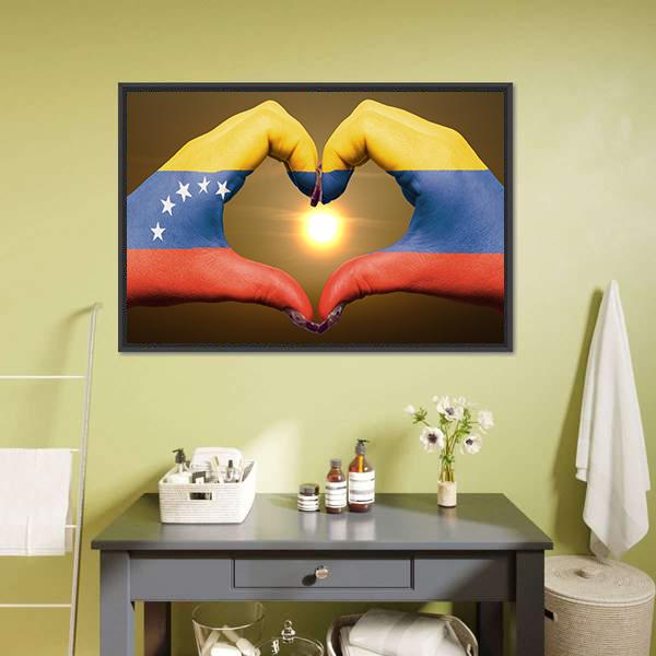 Hands Forming Heart with Venezuelan Flag Canvas Wall Art in red, yellow and blue, framed canvas, product view on a white background