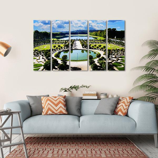 Versailles Royal Garden in Paris Canvas Wall Art in white, green and blue, hung on a wall