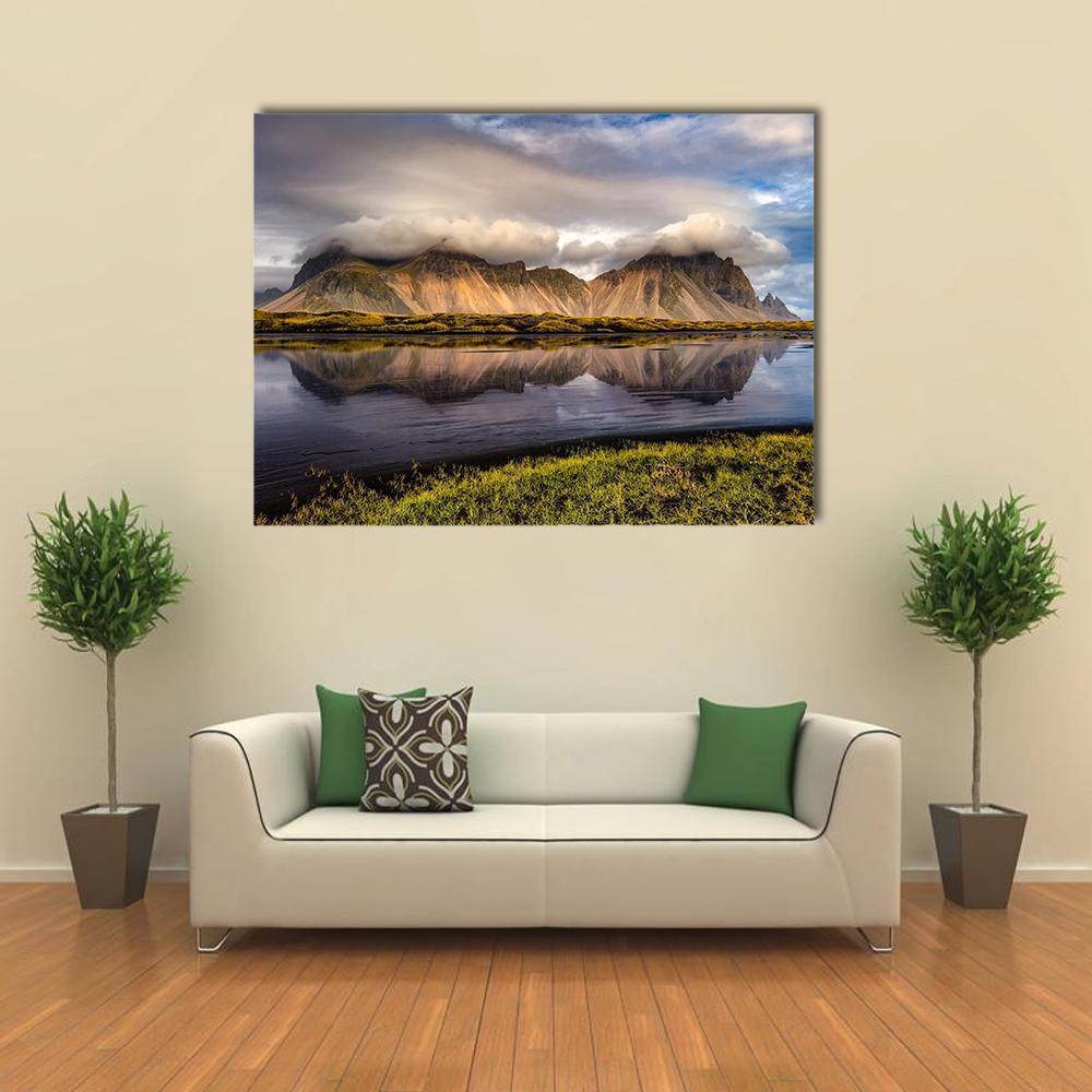 Vestrahorn Lake Reflection at Golden Hour Canvas Wall Art in brown, gold and blue, single panel hung on a wall