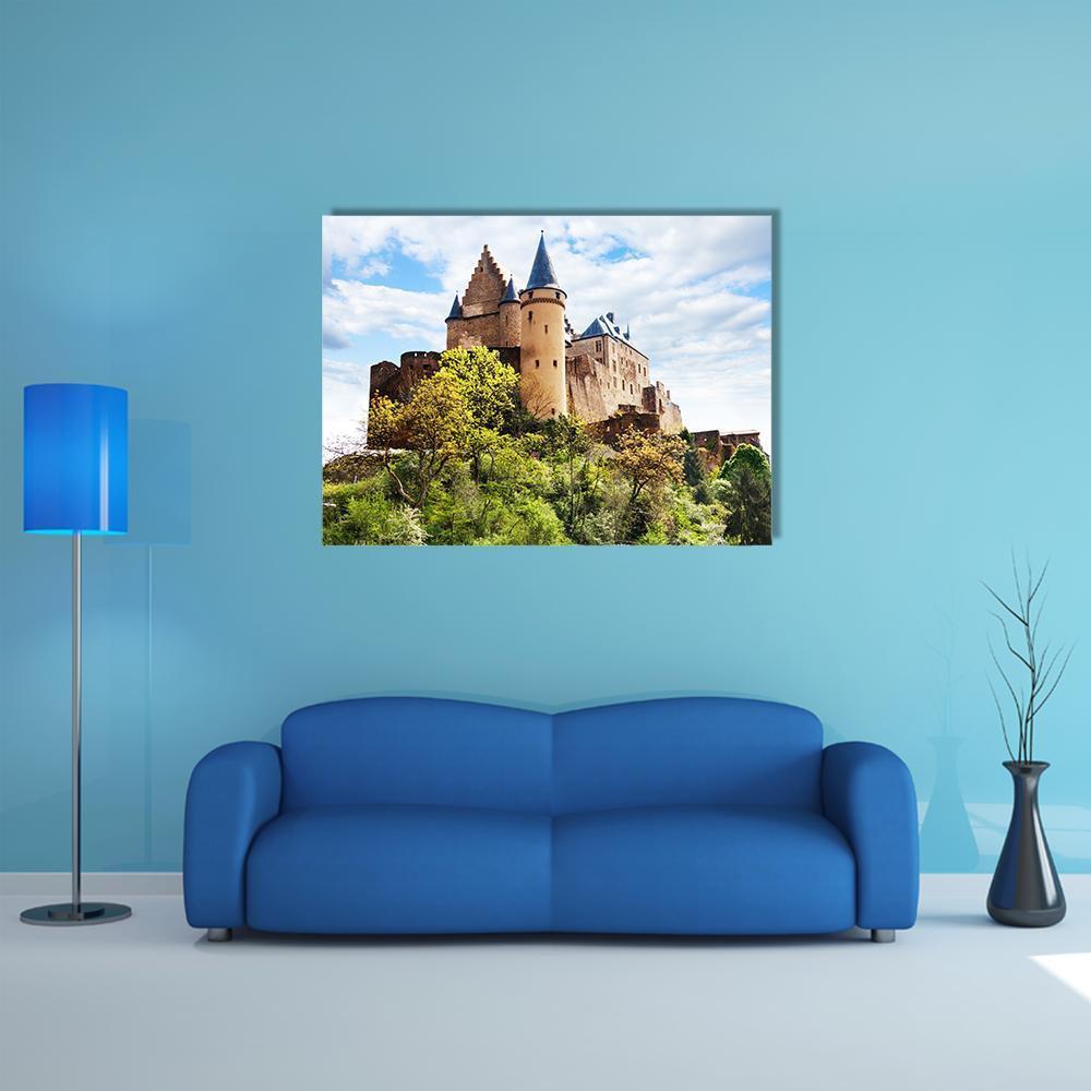 Vianden Castle Fortifications Canvas Wall Art in brown, green and blue, single panel hung on a wall