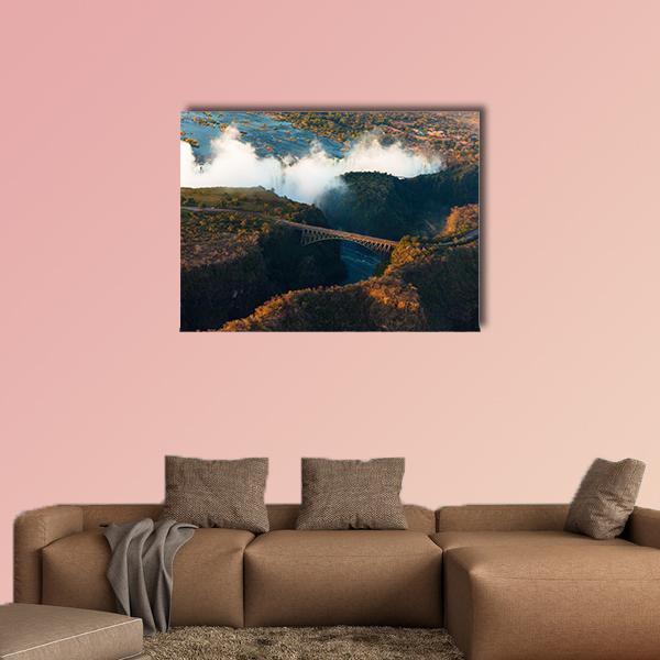 Aerial View of Victoria Falls Canvas Wall Art in white, brown and blue, single panel hung on a wall