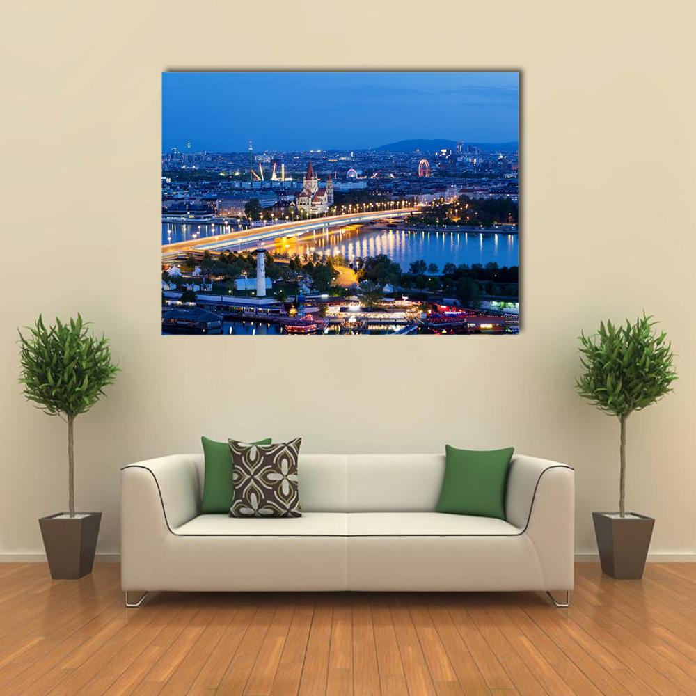 Vienna Night Skyline with Ferris Wheel and Bridge Canvas Wall Art in black, yellow and blue, single panel hung on a wall