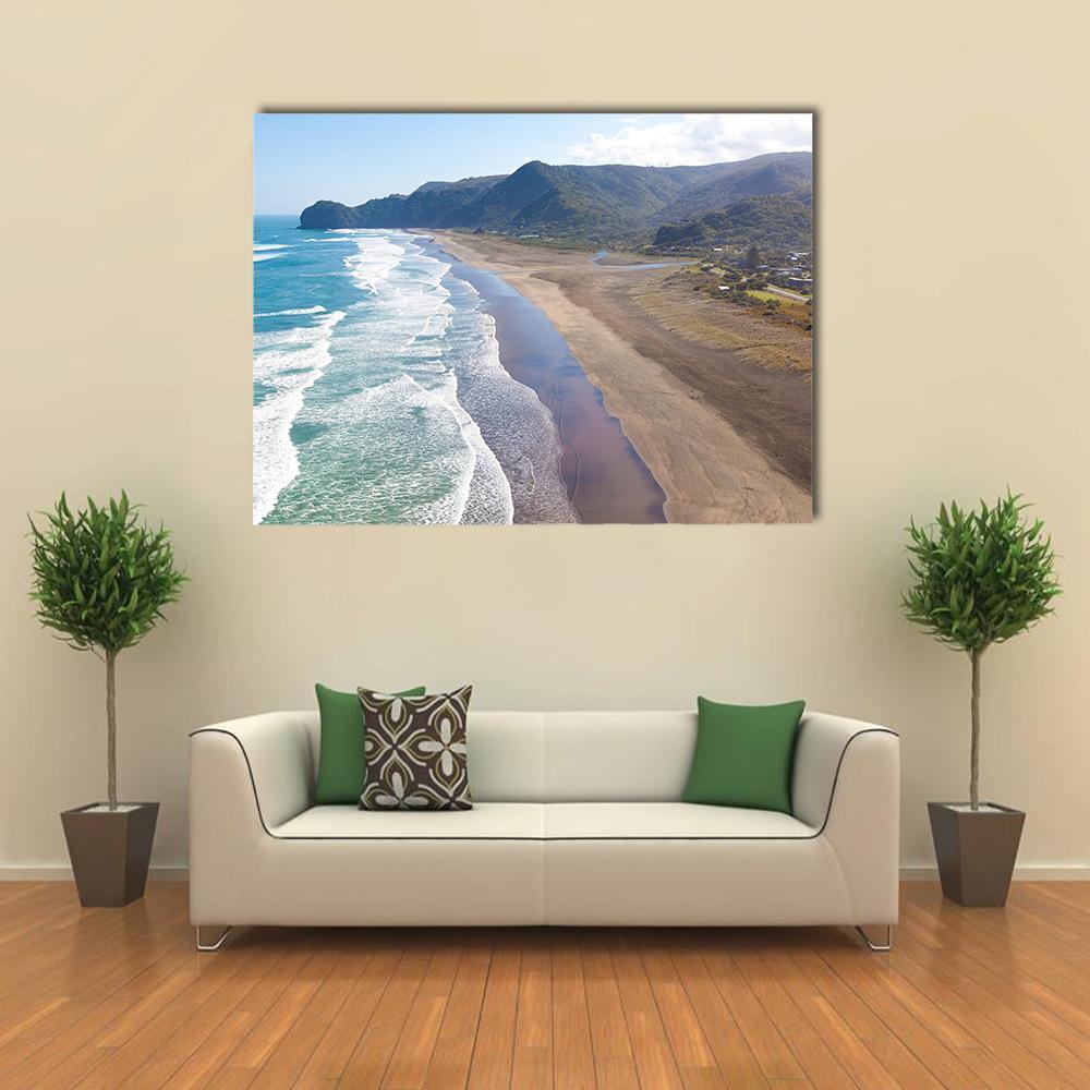 Piha Beach Aerial View Canvas Wall Art in brown, green and blue, single panel hung on a wall