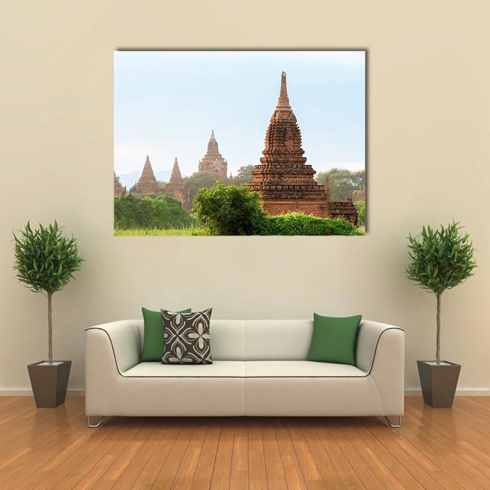 Ancient Pagodas in Bagan Canvas Wall Art in white, brown and green, single panel hung on a wall