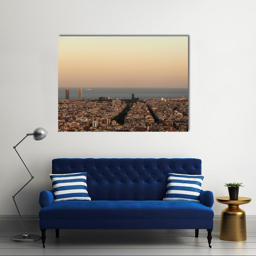 Barcelona Cityscape at Sunset Canvas Wall Art in beige, brown and orange, single panel hung on a wall
