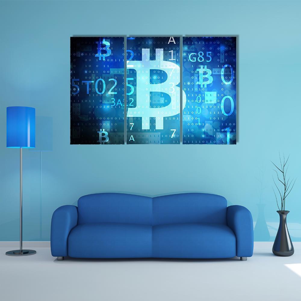 Bitcoin Symbol on Blue Digital Grid Canvas Wall Art in black and blue, 3 panel horizontal set hung on a wall