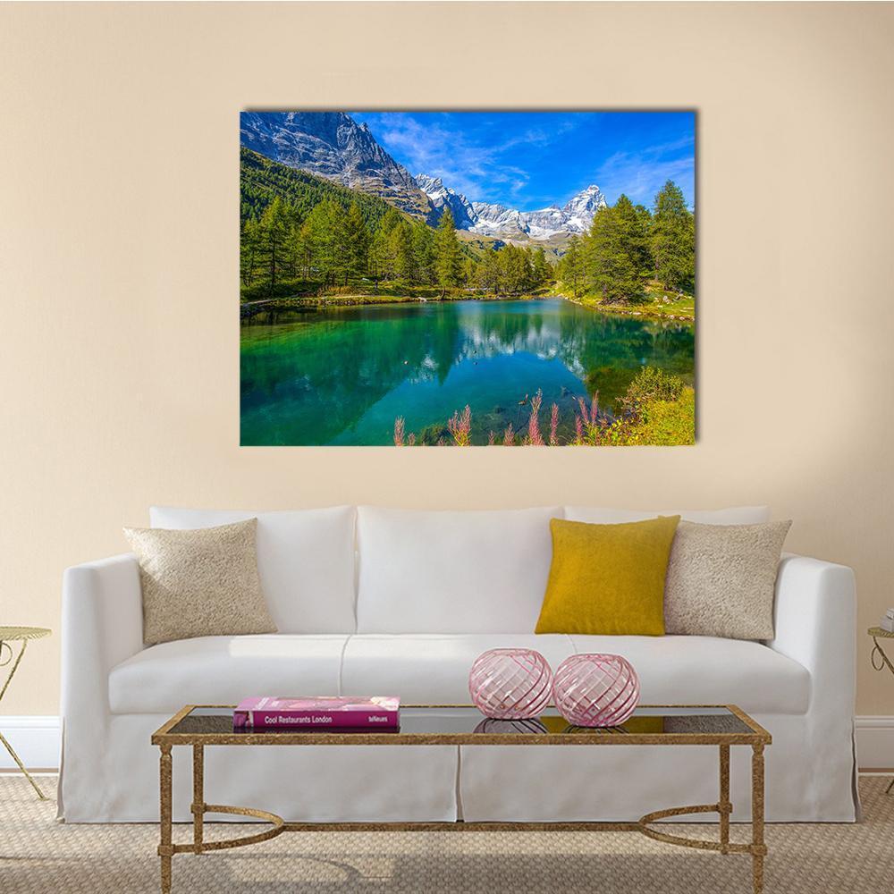 Blue Lake and Matterhorn Canvas Wall Art in green and blue, single panel hung on a wall