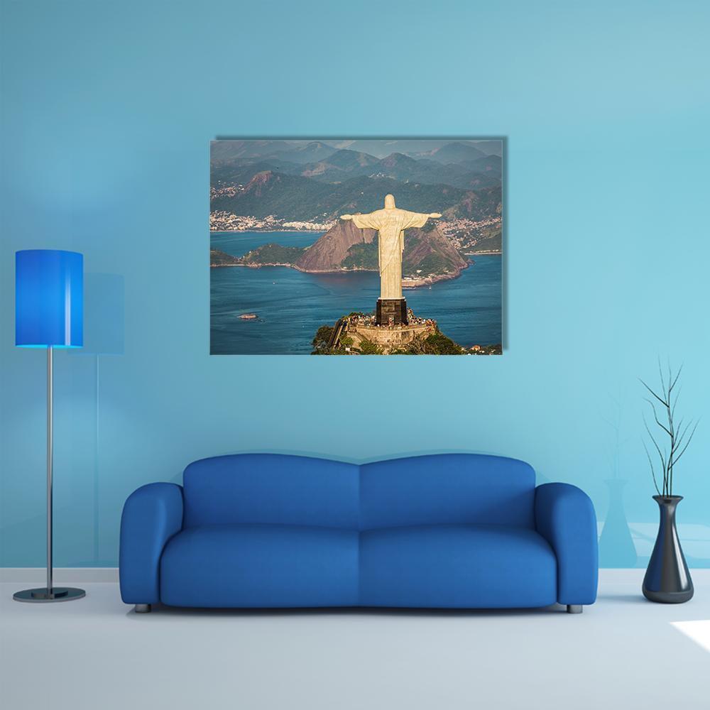 Christ the Redeemer Over Botafogo Bay Canvas Wall Art in beige, green and blue, single panel hung on a wall
