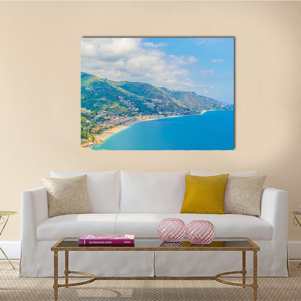 Coastline Near Sicilian City Canvas Wall Art in green and blue, single panel hung on a wall