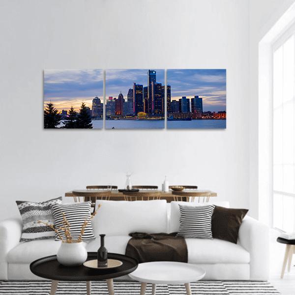 Detroit Skyline at Dusk with Renaissance Center Panoramic Canvas Wall Art in black, orange and blue, hung on a wall