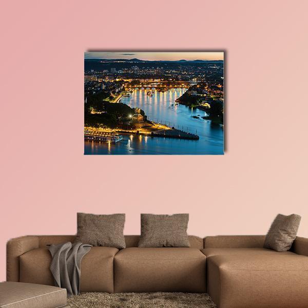 Deutsches Eck Twilight Cityscape Canvas Wall Art in black, yellow and blue, single panel hung on a wall