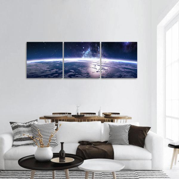 View of Earth from Space Panoramic Canvas Wall Art in black, white and blue, hung on a wall