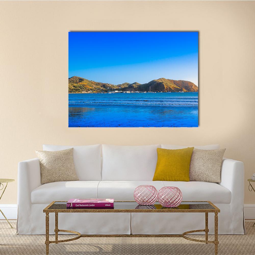 View Of Empty Blue Water Beach Canvas Wall Art-1 Piece-Gallery Wrap-48" x 32"-Tiaracle