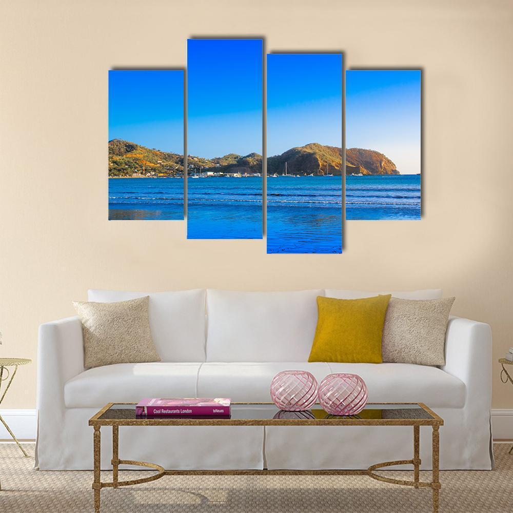 View Of Empty Blue Water Beach Canvas Wall Art-4 Pop-Gallery Wrap-50" x 32"-Tiaracle