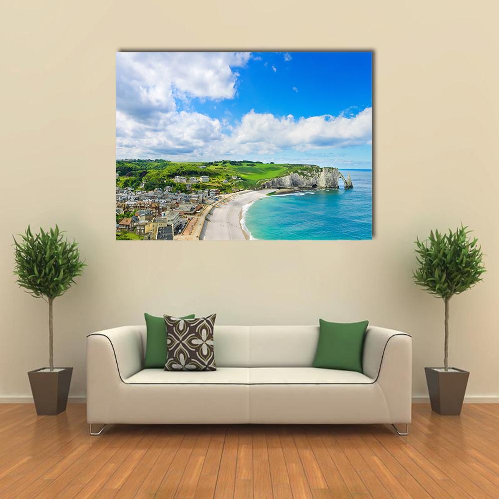 Etretat Village View Canvas Wall Art in white, green and blue, single panel hung on a wall