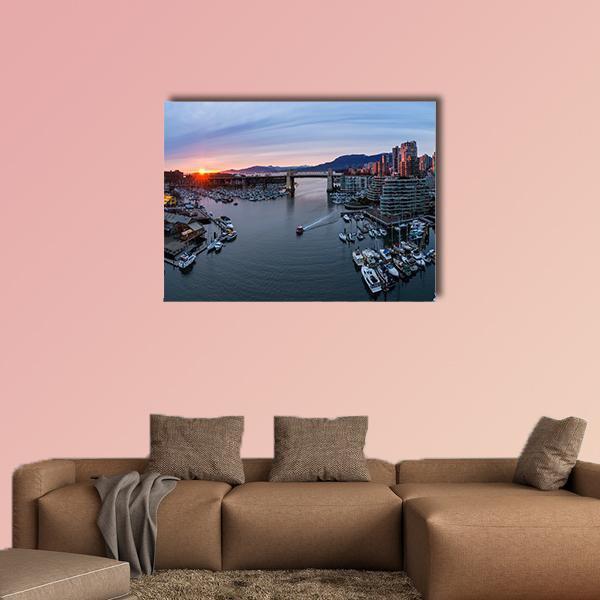 False Creek Sunset Cityscape Canvas Wall Art in orange, blue and purple, single panel hung on a wall