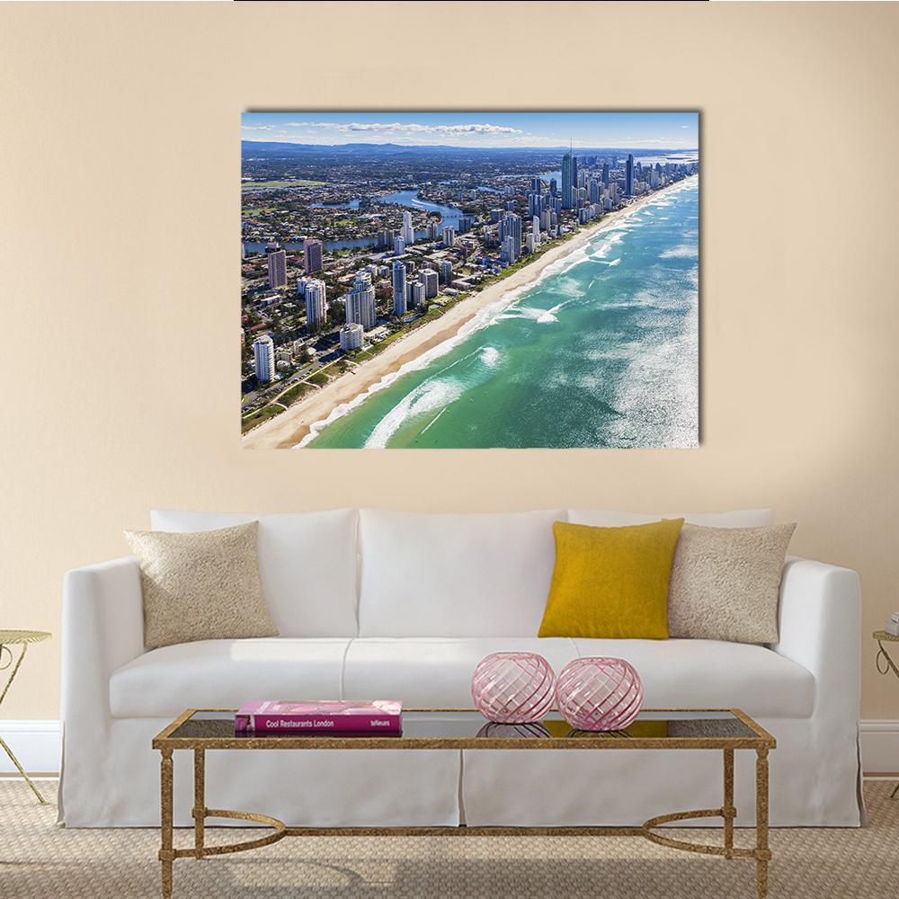 Aerial View of Gold Coast Skyline Canvas Wall Art in white, green and blue, single panel hung on a wall