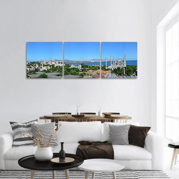 Hagia Sophia Over Istanbul Skyline Panoramic Canvas Wall Art in green and blue, hung on a wall