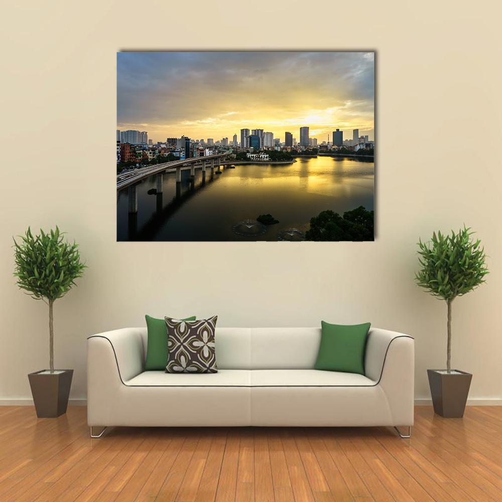 Hanoi Skyline Over Hoang Cau Lake Canvas Wall Art in black, gray and yellow, single panel hung on a wall