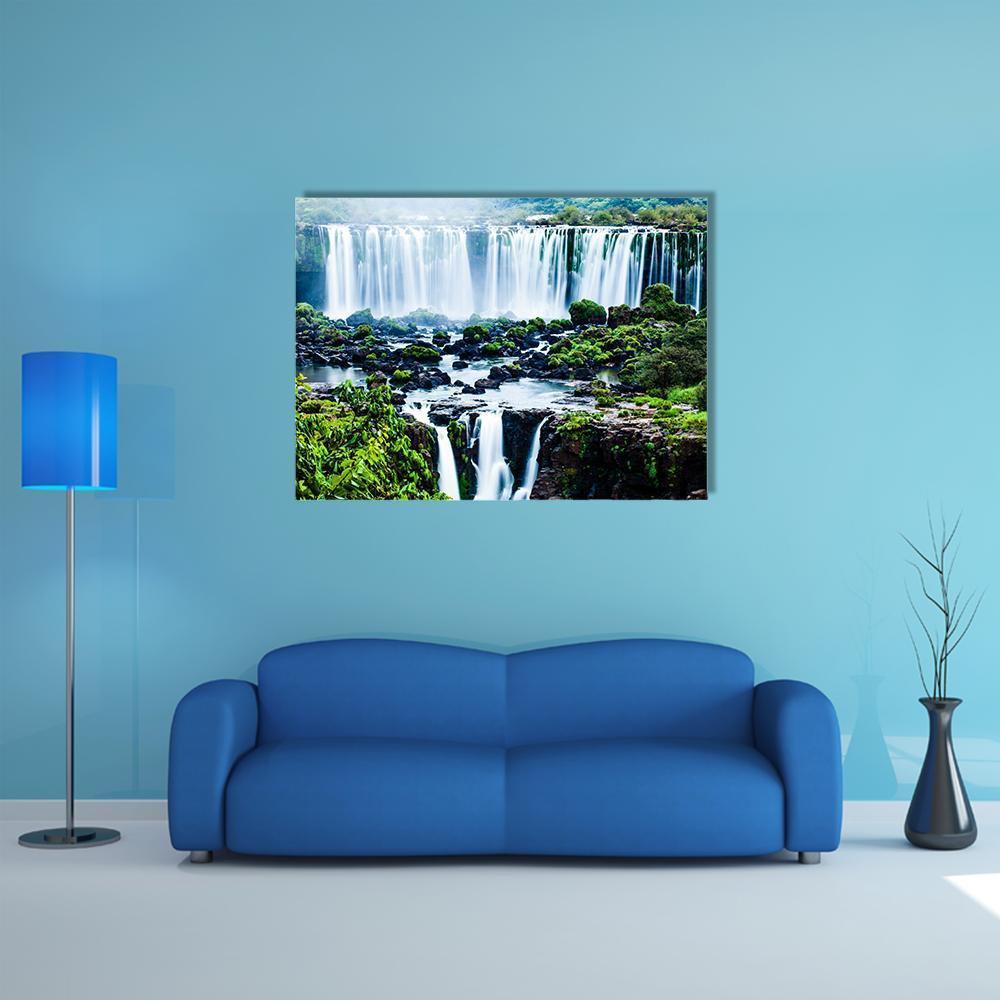 View of Iguassu Falls Canvas Wall Art in white, green and blue, single panel hung on a wall