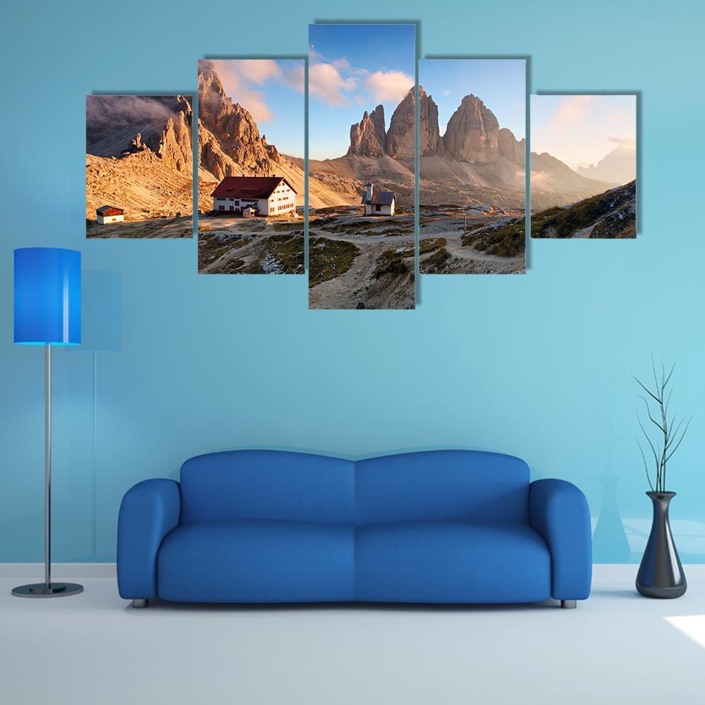 Dolomites Mountain View Canvas Wall Art in white, brown and blue, 5 panel Star layout hung on a wall